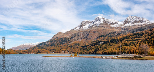 Scenic autumn landscape at lake Silvaplana near St. Moritz photo