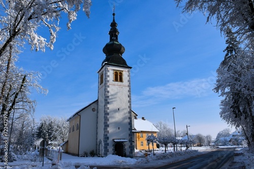 Church in the village of Breg at Sorško Polje in Gorenjska, Slovenia in winter photo