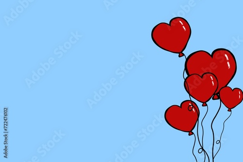 Red heart shaped valentines day balloons on blue background