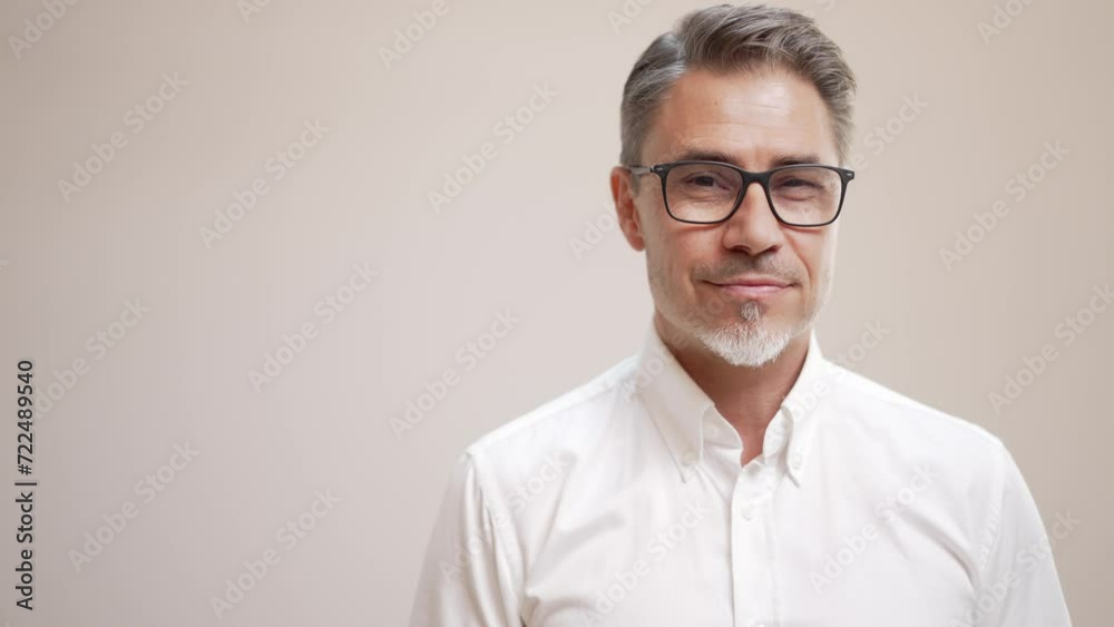 Middle age businessman in white business shirt. Casual entrepreneur. Portrait of mid adult, mature age man, happy smiling. Isolated on white, copy space. Middle age businessman in white business shirt. Casual entrepreneur. Portrait of mid adult, mature age man, happy smiling. Isolated on white, copy space.