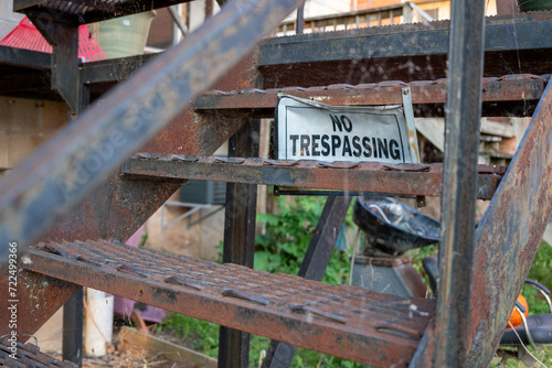 No trespassing sign on stairs