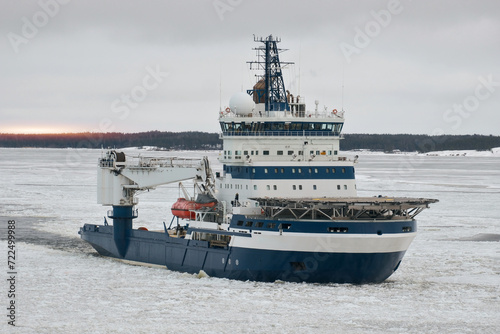 Icebreaker Vessel On Duty For Icebreaking Services For Safe Navigation. Operations In Arctic Areas. photo