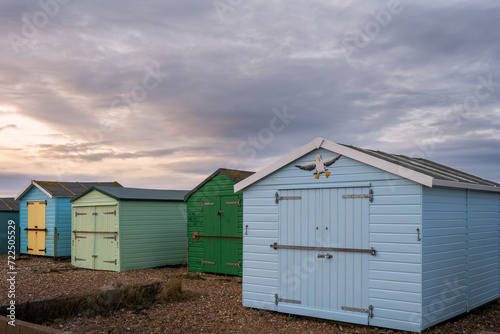 Beach huts on the beach in Shoreham-by-Sea on a winter cloudy day, West Sussex, England  © veronique