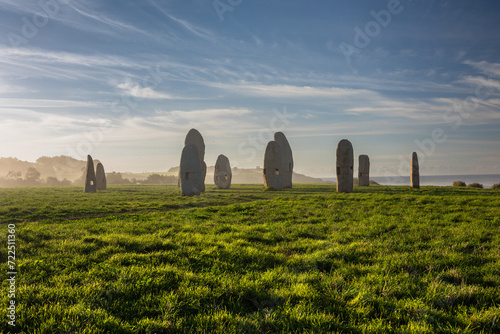 Misty Dawn at Coruna: The Menhirs' Silent Vigil