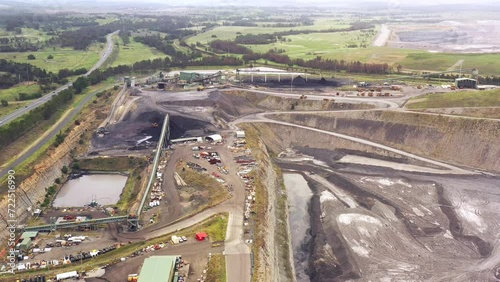Over black coal mine in Hunter valley of Australia near Singleton – machinery 4k.
