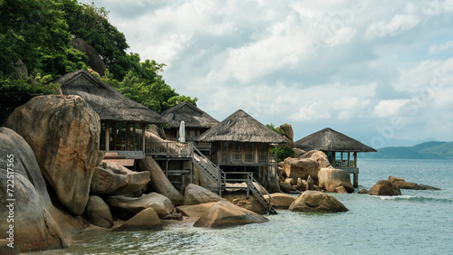 Fototapeta Naklejka Na Ścianę i Meble -  Huts on the beach in Ninh Van Bay, Vietnam