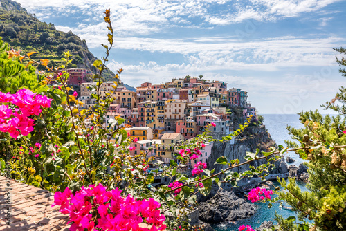Manarola, Italy - August 2, 2023: The picturesque coastal village of Manarola, Cinque Terre, Italy photo