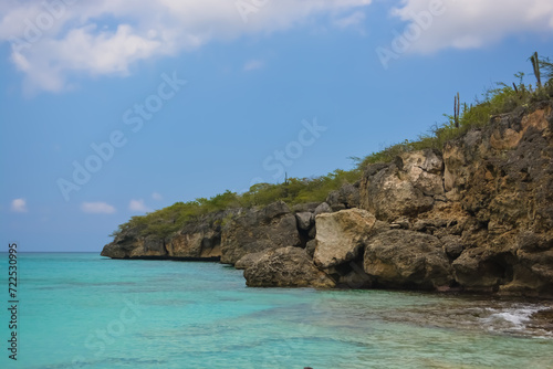 Fototapeta Naklejka Na Ścianę i Meble -  Little Knip beach - paradise white sand beach with blue sky and clear azure water in Curacao, Netherlands Antilles, a Caribbean tropical Island.