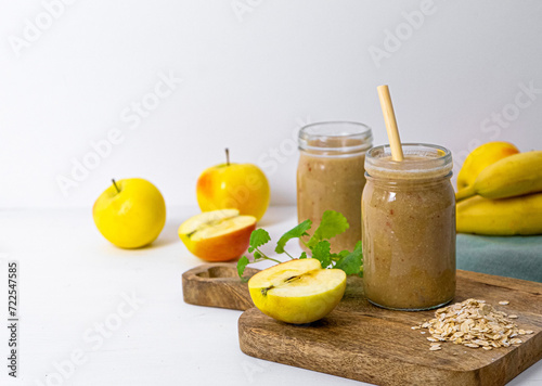 Apple-banana smoothie with oatmeal. Space for Text