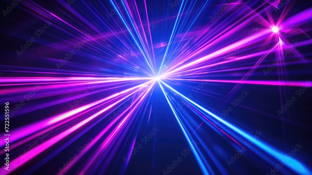 Obraz premium Blue and violet beams of bright laser light shining on black background