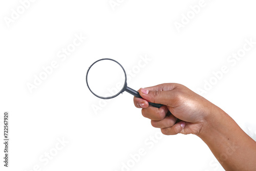 hand holding magnifying glass isolated on white