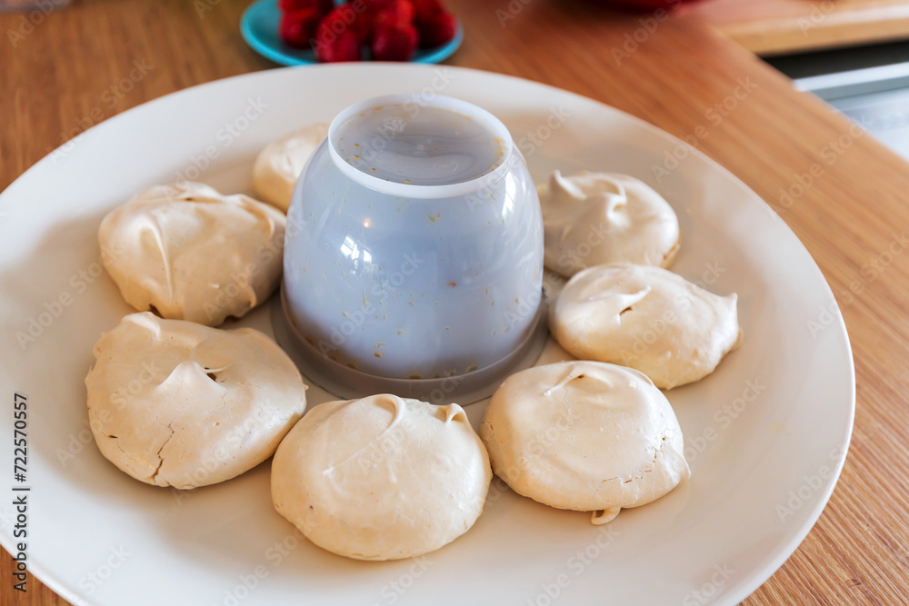Delicate meringues await their transformation Delicate meringues await their transformation