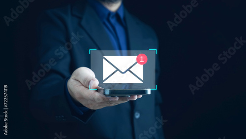 New email notification concept for business e-mail communication and digital marketing. Inbox receiving electronic message alert. business people touch on email in virtual screen. internet technology.