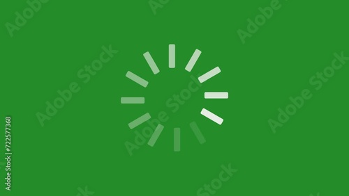 Loading, buffering white circle icon animation on a green background. Seamless loop video of rotating, spinning circle for signal, data, video stream, transfer technology, or computer concept photo