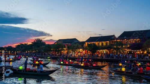 Time lapse of Hoi An Vietnam The ancient city of UNESCO World Heritage in Quang Nam Province It is a popular tourist attraction where colorful lantern boats sail on the river photo