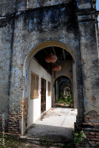 Dilapidated vintage corridor in the abandoned tin mining town of Jalan Papan in the outskirts of the city of Pusing, Perak, Malaysia