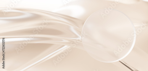 ベージュ背景に透明なガラスの円と布。コピースペース。3D（横長） photo