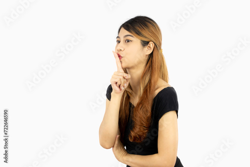 Young asian woman in black t shirt posing silence isolated on white background, emotional.