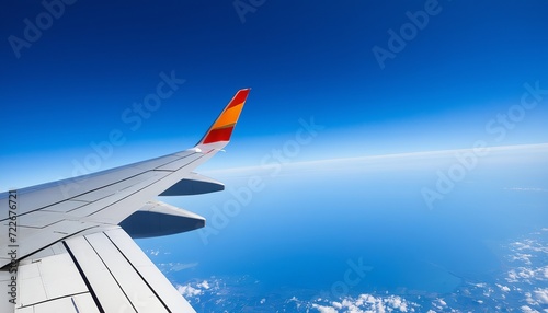 Vector Art: Bright Blue Sky with Airplane Wing