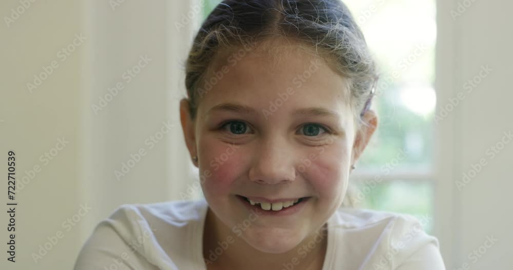 Child, face and smile in home relax as confident girl for development, weekend or innocent. Female person, portrait and happy kid in apartment for summer vacation or good mood, positive or carefree Child, face and smile in home relax as confident girl for development, weekend or innocent. Female person, portrait and happy kid in apartment for summer vacation or good mood, positive or carefree