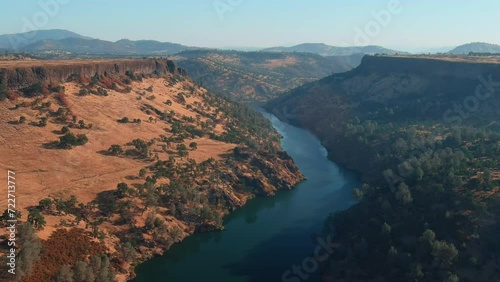 Aerial View Of Lake Tulloch Between The Mountain Bluff In Copperopolis, California, USA. photo