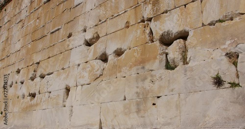 Close up of ancient stone wall of theater in Miletus. photo