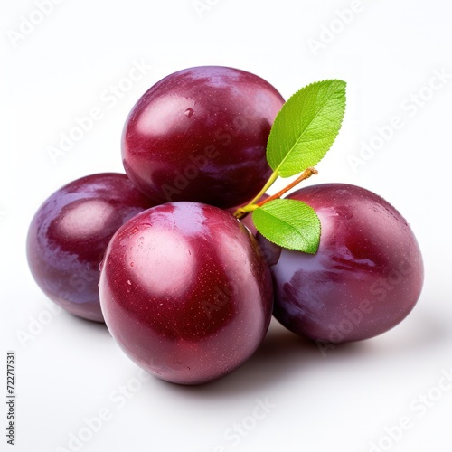 A ripe plum on a white background