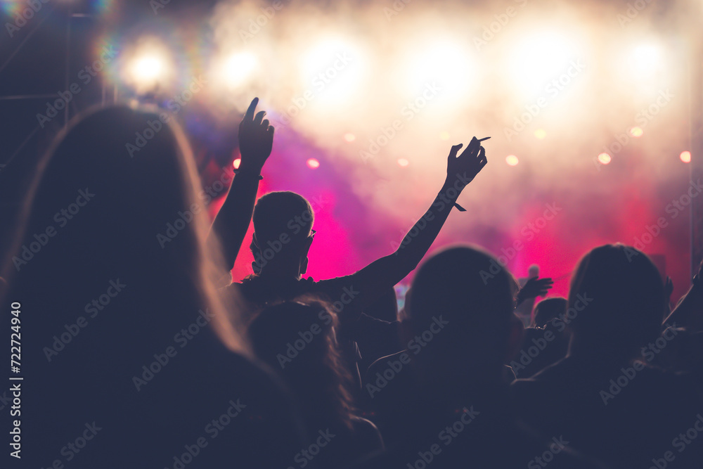 Abstract photo of crowd at concert and blurred stage lights. Abstract photo of crowd at concert and blurred stage lights.