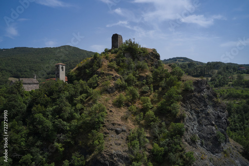Historic heights: Castello di Pietramogolana and Viadotto Rio Pietramogolana captured in a captivating drone panorama. Explore the beauty of Pietramogolana PR.