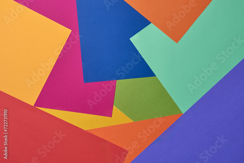 modern abstract of colorful paper sheets layout, geometric diagonal lines design background wallpaper or backdrop for cards, banners and posters, textured surface taken from above with copy space