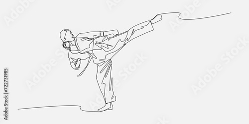 female karateka showing kicking technique. continuous one line drawing style. editable stroke. vector illustration
