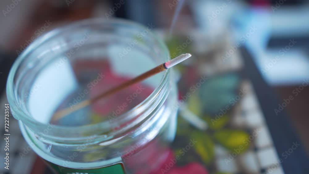 Close up of Asian Buddhist Incense Stick. Aromatic stick smoldering Close up of Asian Buddhist Incense Stick. Aromatic stick smoldering