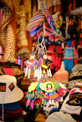 vertical photo of colorful handmade keychains for travel reducer in la paz bolivia