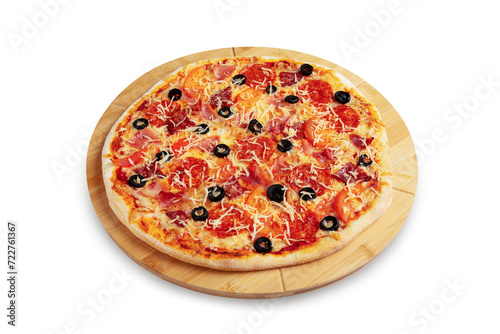 Pizza with meat, sausage, bacon, tomato and olives on a wooden board, isolated.
