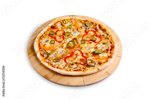 Mexican pizza with peppers, mushrooms and jalapenos on a wooden board, isolated.