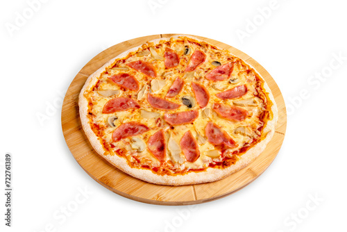 Pizza with ham, mushrooms and cheese on a wooden board, isolated.