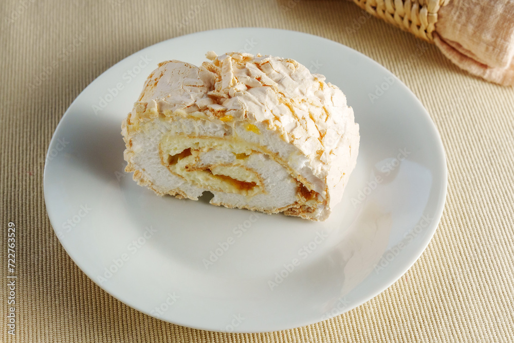 Sweet Temptation: A Frosted Delight Atop a Gleaming White Plate Sweet Temptation: A Frosted Delight Atop a Gleaming White Plate