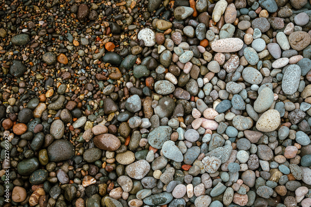 Wet pebble stones on the beach Wet pebble stones on the beach