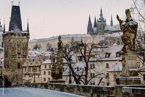 Snowy Charles Bridge in Prague in winter, no people, morning