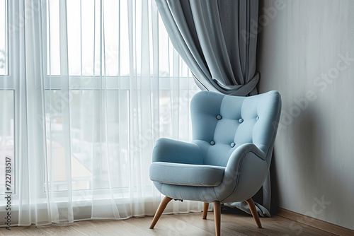 soft blue chair near the window