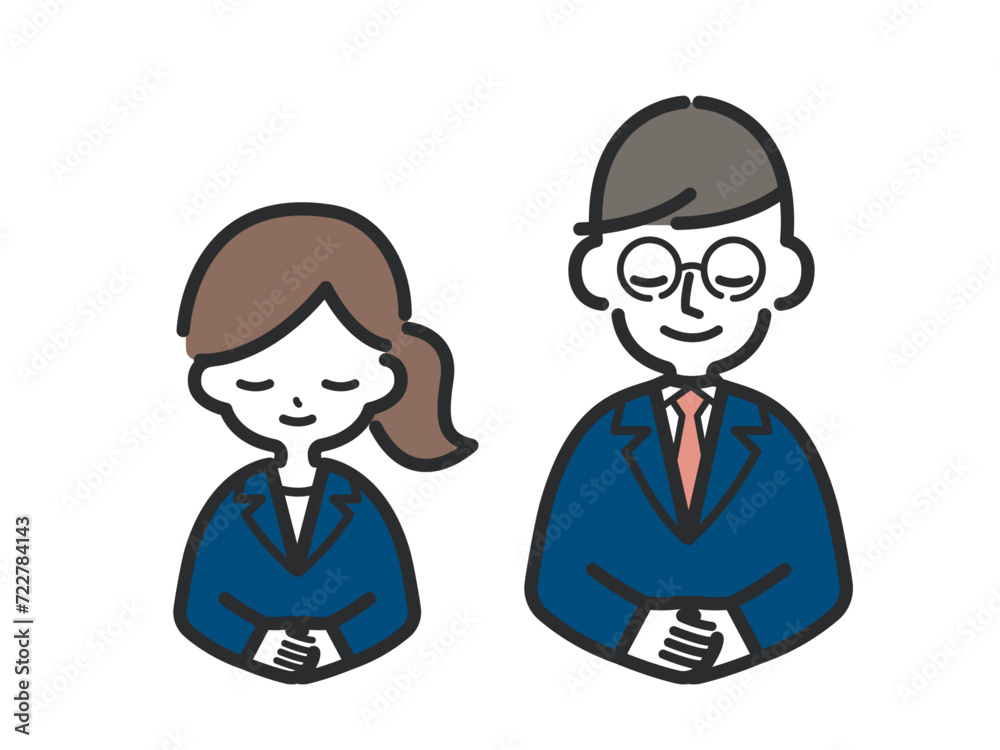 お辞儀をしているスーツ姿の男女