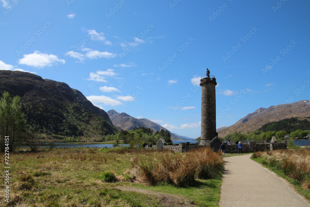The Glenfinnan Monument is located in the Scottish Highlands on the shores of Loch Shiel