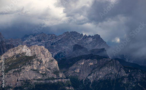 Panoramic view from the top of the Marmolada Glacier in summer mist, Dolomites, South Tyrol, Italy.