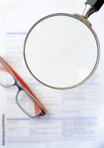 business papers, eyeglasses and magnifier with free copy space.Business contact,paperwork,meeting concept. Template or mockup with free copy and log space