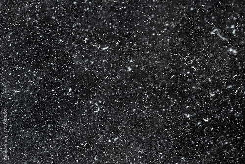 White dust on the black surface of the object. Soft focus. Contamination of screens, monitors. Black and white image. 3D rendering, illustration