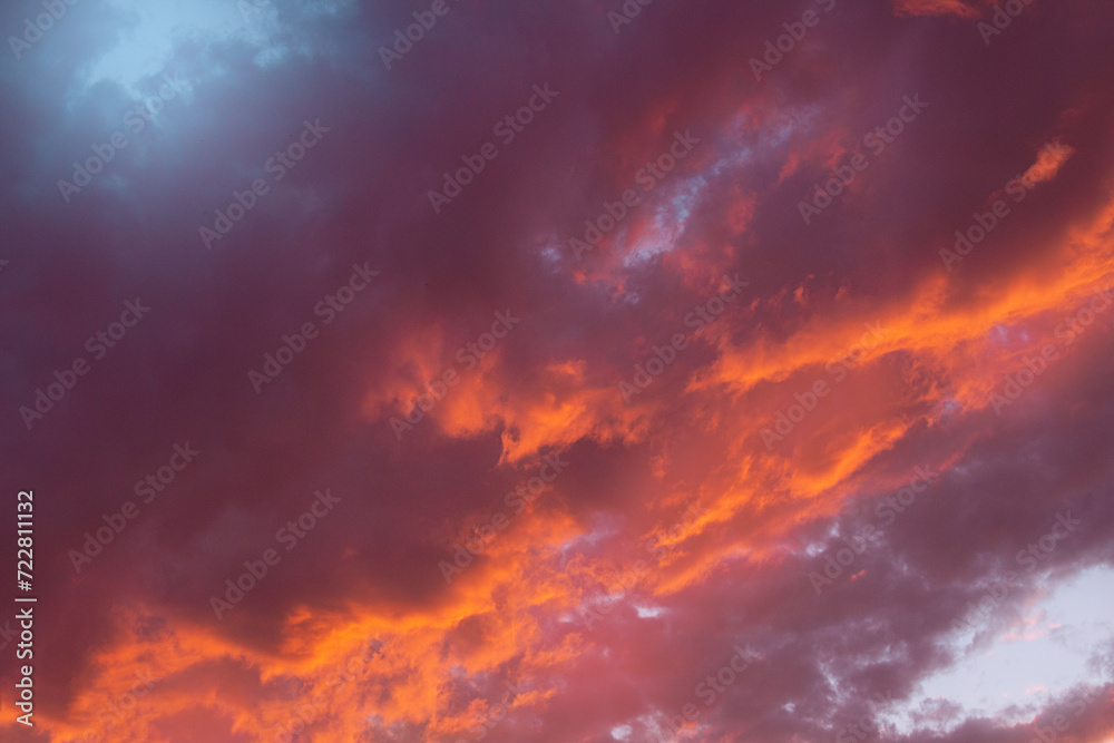 Beautiful purple blue sunset sky with cumulus clouds. Natural background. Copy space
