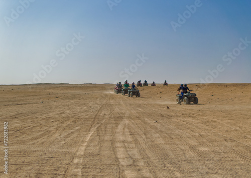 Obraz na płótnie Tourists during quad safari in desert near Hurghada, Egypt. w salonie