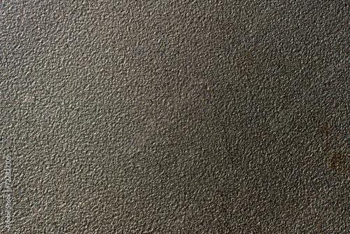 Bronze background with metallic glitter texture in full frame, closeup