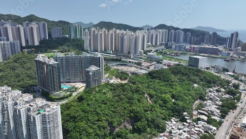 Hong Kong, Kowloon Bay, Ngau Tau Kok, Kwun Tong, Lam Tin, Cha Kwo Ling, Yau Tong Business District, adjacent to Victoria Harbor, enjoying the view of Victoria Harbor. Hong Kong's industrial center  photo