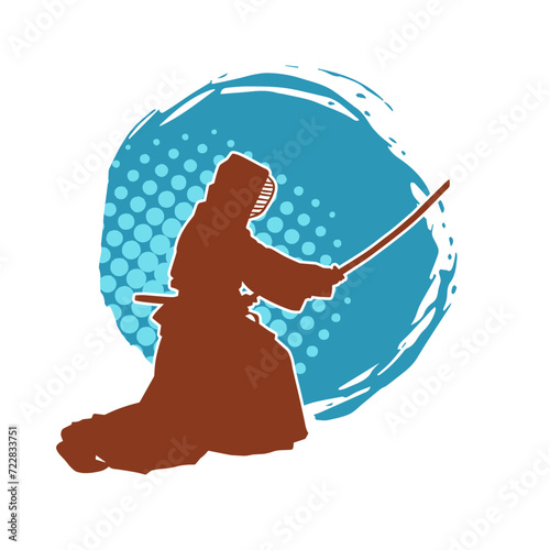 Silhouette of a sword warrior in action pose. Silhouette of a martial art person carrying sword weapon. Silhouette of kendo martial art pose.
